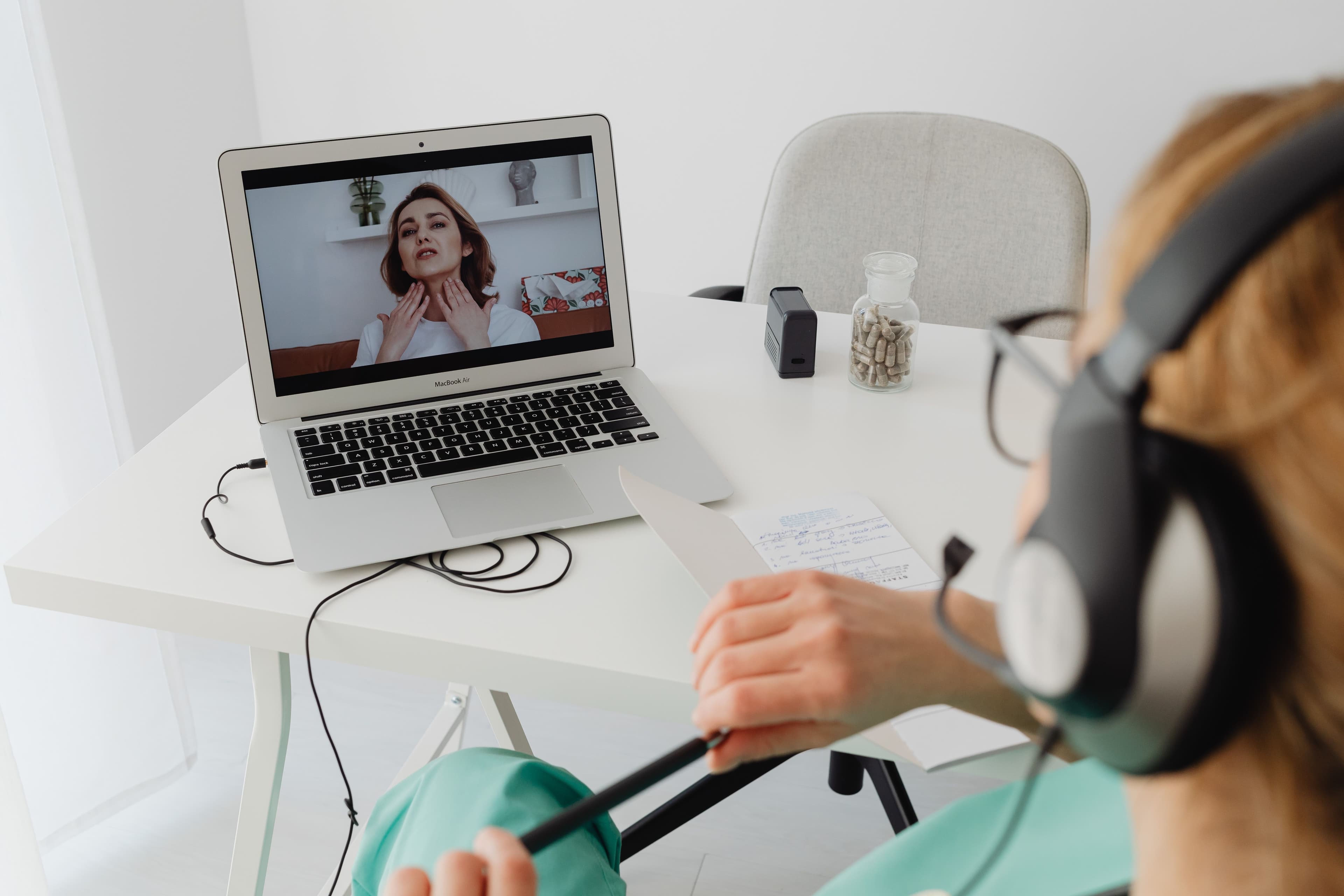 Telehealth practitioner preparing for an online consultation